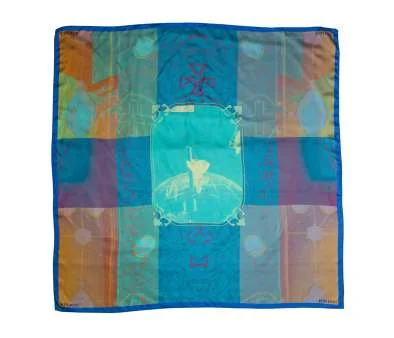 The Harmony scarf: blue, turquoise and violet checks around a figure, with a blue border